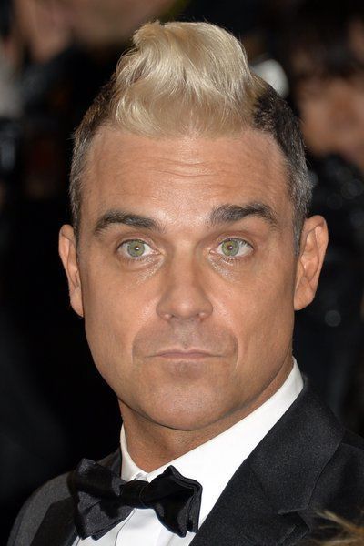 60828315_lay_robbie_williams_2015_cannes_picture_alliance_capital_pictures.jpg
