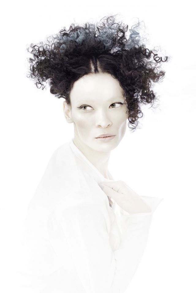Collection Name: African Fashion Warrior - Curls Hair: Connie De Sousa of C.Jays for Intercoiffure South Africa Photographer: Coert Wiechers Make Up Artist: Ryno Mulder Stylist: Jenny Andrew & Stoffel Van Wyk
